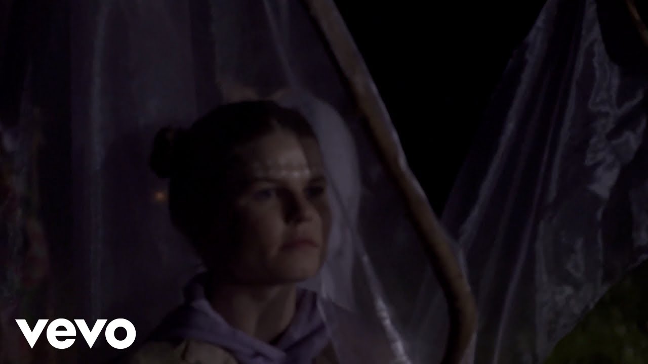 MOLTENO in the Moonlight video, lit in blue against a night sky.